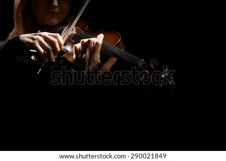 Violin player violinist hands. Musical instruments orchestra music playing violin closeup