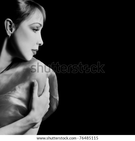 Beautiful woman profile. Portrait black and white attractive lady isolated on black