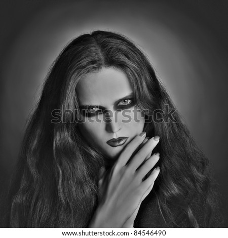 Portrait of gothic woman. Artistic black and white photo