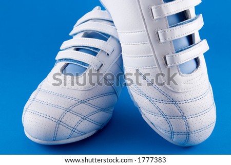 Pair of white training shoes