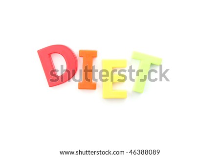 Diet spelled out using fridge magnets on a white background