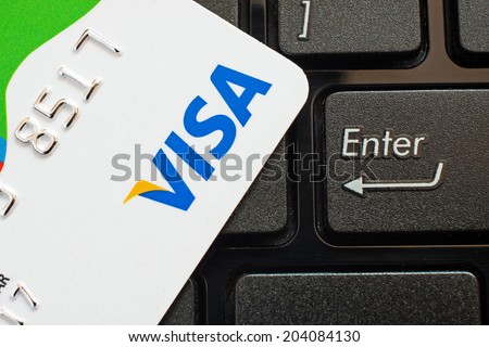 GDANSK, POLAND - 10 JULY 2014. Shopping on the Internet - Visa card on the notebook keyboard. Visa is an American multinational financial services corporation.