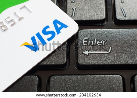 GDANSK, POLAND - 10 JULY 2014. Shopping on the Internet - Visa card on the notebook keyboard.