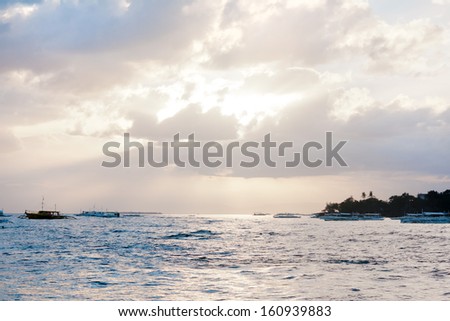 Diving boats on the sea and the sunset.