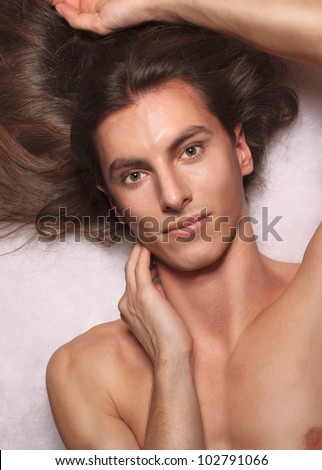 Young charming long haired man