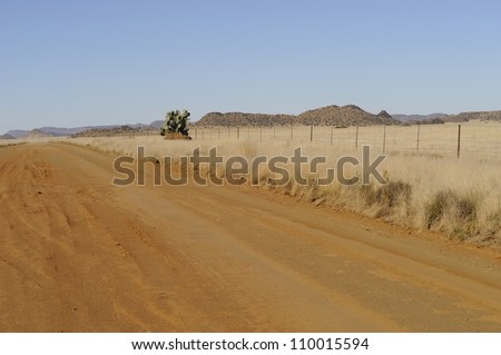 Gravel road between Putsonderwater (Pit without water) and Brakbos in a remote corner of the Karoo, Northern Cape, South africa