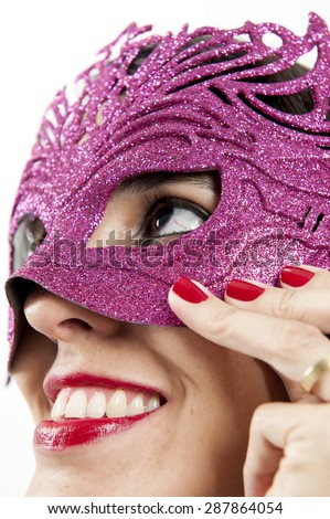 Girl using a mask to cover her face