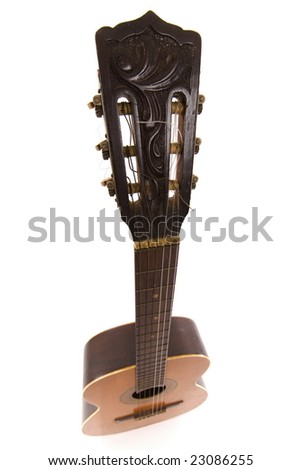 Wood Guitar from a different perspective on white .