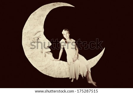 Pretty girl on vintage paper moon