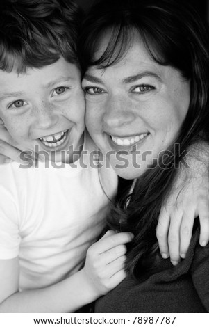 Black and white photo of a happy mother and son