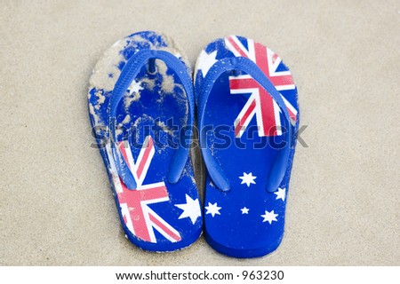 A pair of sandals, known as \'thongs\' in Australia, decorated with the Australian flag.