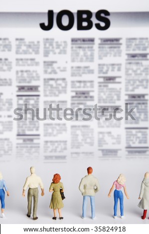 miniature figurine of people standing in front of jobs  seeking offerings
