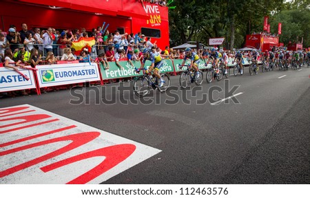 MADRID - SEPTEMBER 9: Spanish Vuelta (cycling), Saxo bank team leading the main group with japanese Yukihiro in 4th position in the final stage of the vuelta on September 9, 2012 in Madrid (Spain).