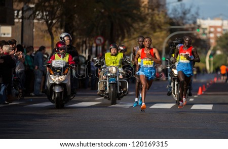 VALENCIA - NOVEMBER 18: Gemechu Worku Biru (number 3) leads the first group at 32 km marker of mens marathon, in Valencias marathon on November 18, 2012 in Valencia, Spain