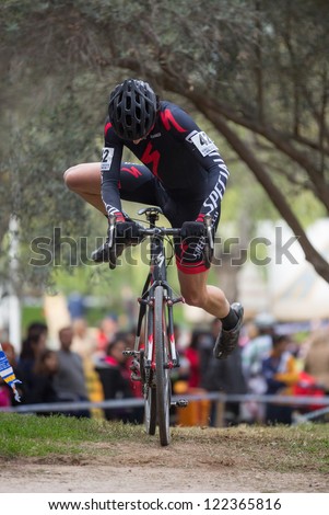 VALENCIA - DECEMBER 16: Jorge Rodriguez (number 42, Stecchino mtb team) participates in XXVII edition of Cyclo-cross city of Valencia on December 16, 2012 in Valencia, Spain