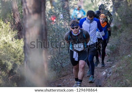 CASTELLON - FEBRUARY 24: Daniel Sancho Cases (number 594) leads group in his participation in XV Edition of Espadan mountain marathon on February 24, 2013 in Castellon, Spain