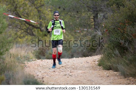CASTELLON - FEBRUARY 24: Salva Pascual Soler (number 498) participates in XV Edition of Espadan mountain marathon on February 24, 2013 in Castellon, Spain