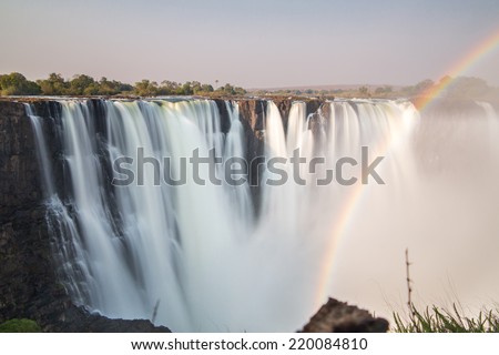 Victoria Falls, rainbow and silk water, long exposure photo, Zimbabwe side