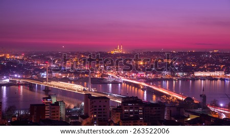 Long exposure of golden horn with mosque skyline in Istanbul at night, pink colors