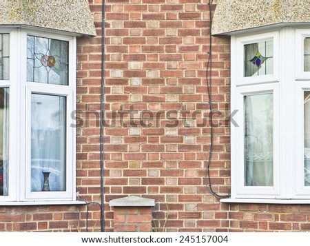 Double glazed bay windows in adjoining houses