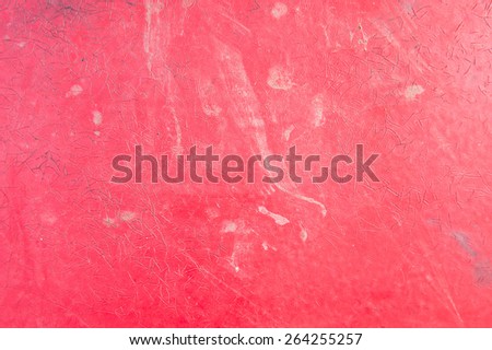 A messy red plastic surface as an abstract image