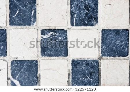 Black and white square tiles as a background