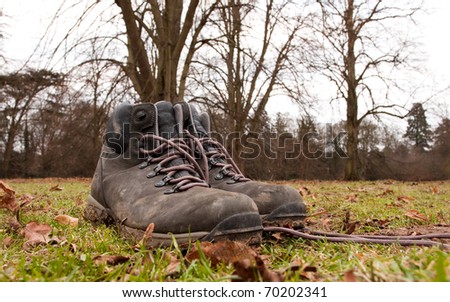 Muddy walking boots in an outdoor setting