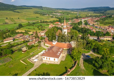 The fortified Church and  parish house in Crit, Brasov, Romania. Also known as Deutsch Kreuz village Photo stock © 