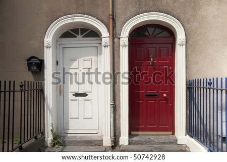 Two doors side by side painted in red and white