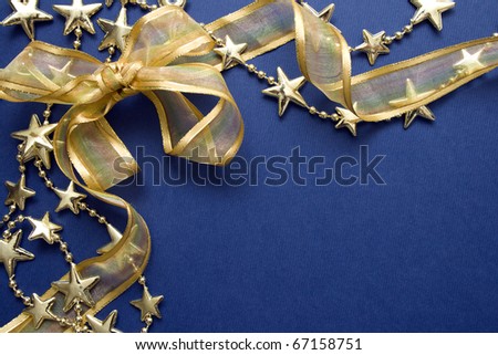 Greeting cards and gold stars on blue paper. Natural Textures