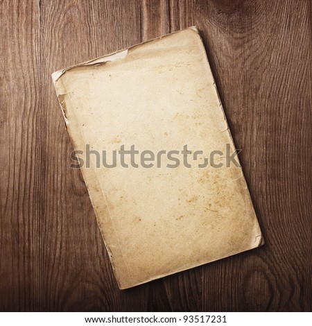 old papers on a wooden table