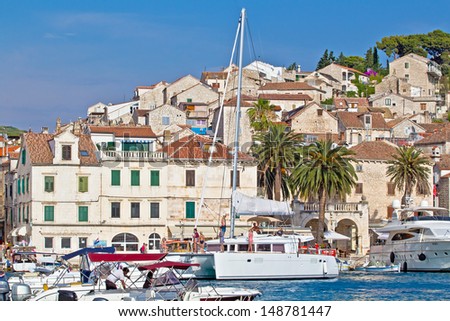 European Southern City Scape. Sea, Bay, Boat, Mountain, Houses, Blue Sky, Resort & Holiday. Hvar. Croatia.