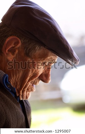 Old man portrait backlighted