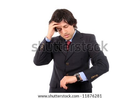 worried businessman consulting his watch, isolated on white background