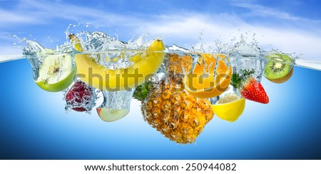 many fruits splashes into water