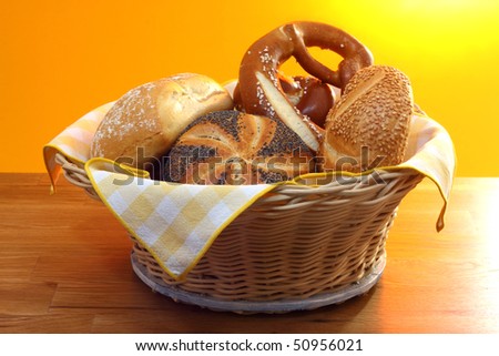 breakfast basket with buns and pretzel