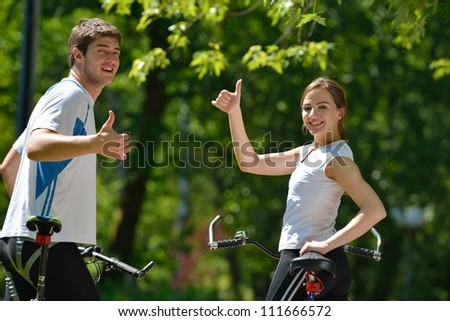 Young couple jogging in park at morning. Health and fitness.