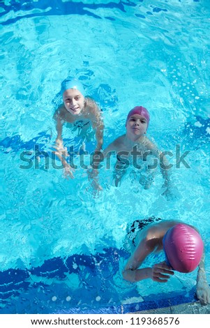 happy chid have fun on swimming pool