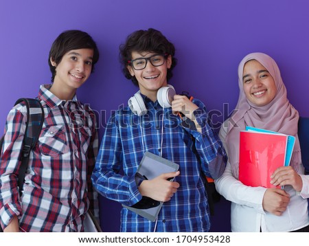 Similar – Image, Stock Photo Ethnic teenage boy with Down syndrome browsing laptop at home