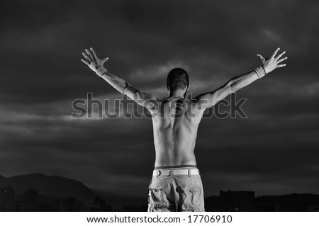 Man with his arms wide open