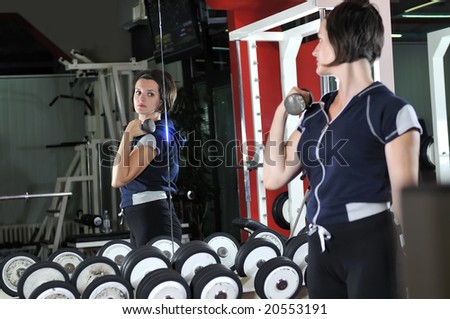 young healthy woman work out in fitness