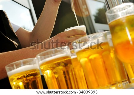 barman beer drink on buffet party background