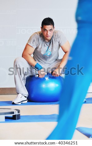 one young healthy man exercise fitness recreation and yoga indoor