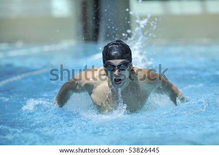 young healthy man with muscular body in swimming pool and representing healthy and recreation concept
