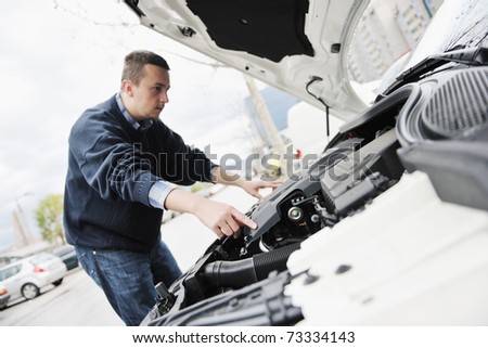 man looking at new car vihicle engine and try to find probelm at repair fix and maintanance service
