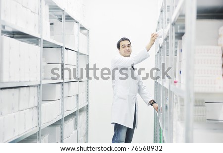 medical factory  supplies storage indoor with workers people