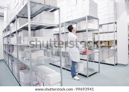 medical factory  supplies storage indoor with workers people