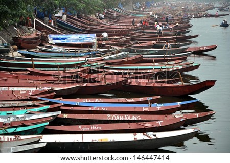 PERFUME RIVER - FEB 26: Hundreds of boats waiting for the pilgrims to take them to Perfume pagoda which is Vietnam\'s most important religious destination. On Feb. 26, 2013, in Ninh Binh, Vietnam