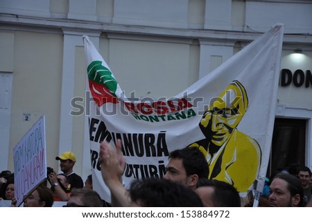 CLUJ - SEPT 1: People join a protest against the Romanian Government that passed a law allowing the gold extraction project at Rosia Montana against the people\'s will. On Sept 1, 2013 in Cluj, Romania