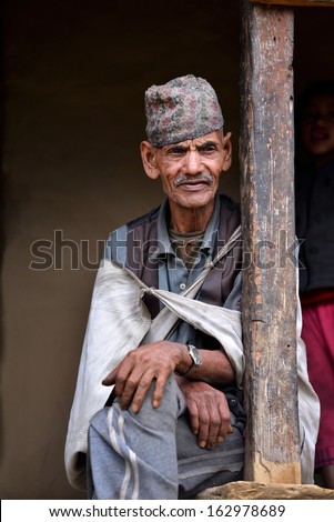 GHANDRUK - OCT 6: Portrait of an old Gurung Sherpa. Gurungs are the biggest ethnic group in the Himalaya and a part of them working as Sherpas for climbing expeditions. Oct 6, 2013 in Ghandruk, Nepal